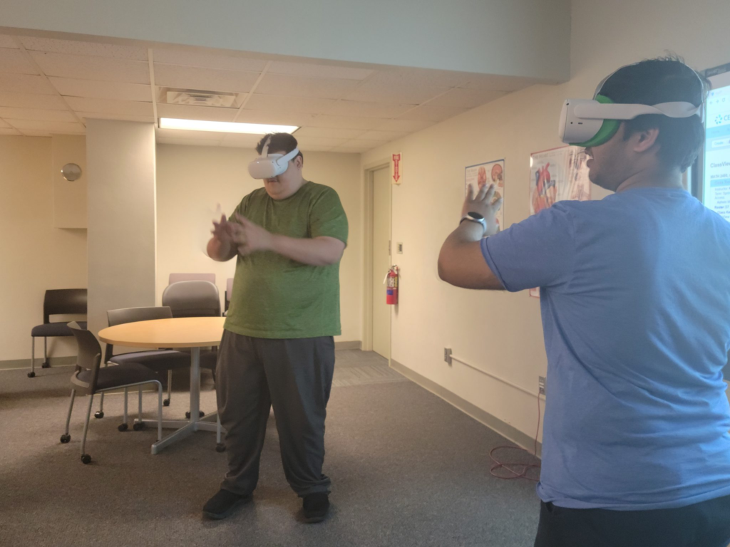 Two people using VR headsets